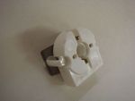 BUILT IN 3/4 ROUND, SPRING LOADED FL. LAMP SOCKET